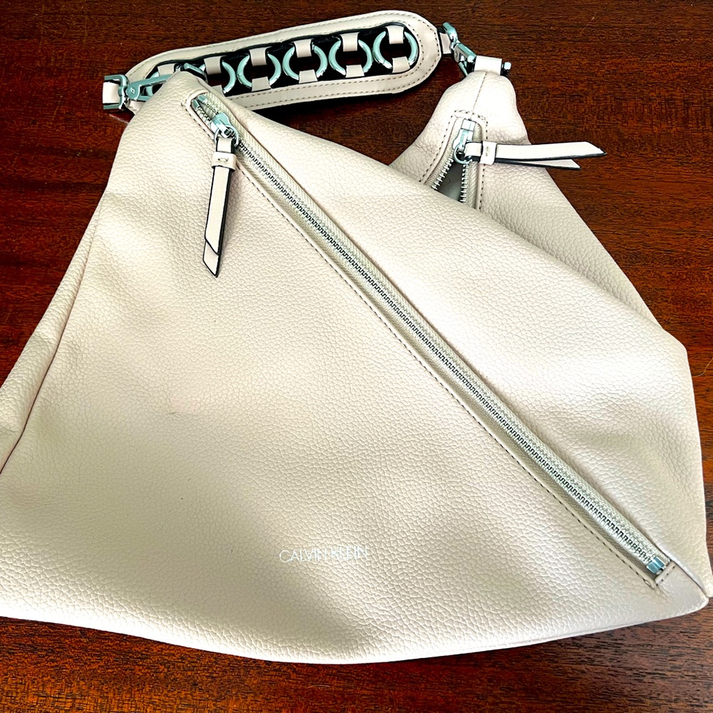 Calvin Klein Geo Rocky Road Hobo Bag in Pink